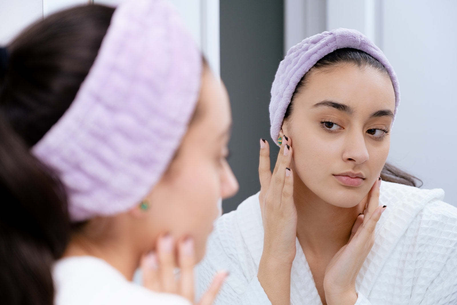 a women looking fabulous after a lymphatic face drainage . face sculpted and firmer 